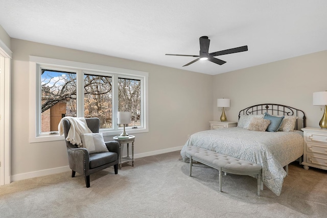bedroom with carpet floors, baseboards, and ceiling fan