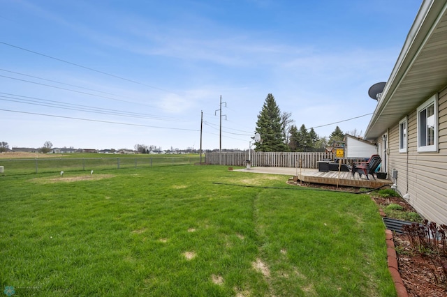 view of yard featuring a wooden deck