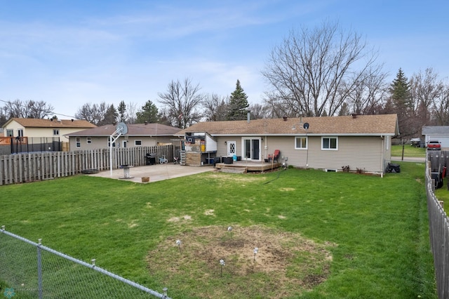 back of house with a patio and a deck