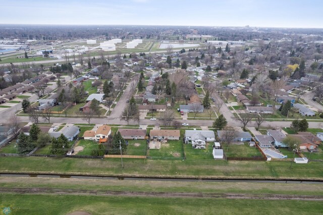 aerial view of property's location with nearby suburban area