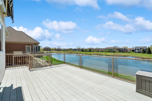 deck featuring a water view