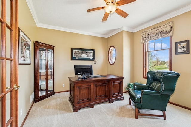office area with ceiling fan, light carpet, baseboards, visible vents, and ornamental molding