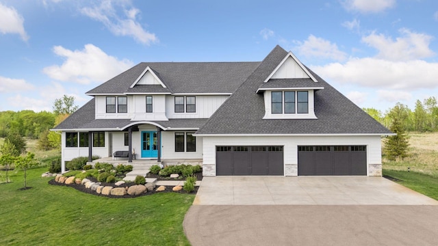 7450 73rd Ct N, Grant, MN 55082 - view of front of house with concrete driveway, roof with shingles, french doors, and a front lawn