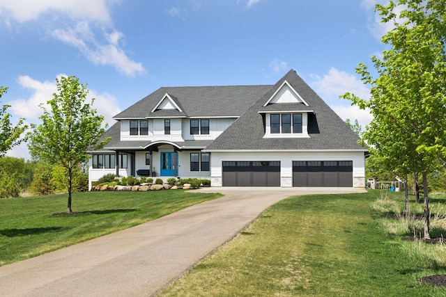 7450 73rd Ct N, Grant, MN 55082 - view of front of house featuring concrete driveway, a front yard, and a shingled roof
