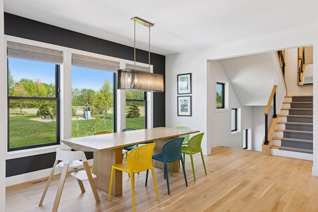 7450 73rd Ct N, Grant, MN 55082 - dining room featuring plenty of natural light, stairs, and light wood finished floors