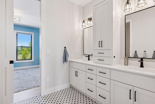 7450 73rd Ct N, Grant, MN 55082 - full bathroom with tile patterned floors, baseboards, and double vanity