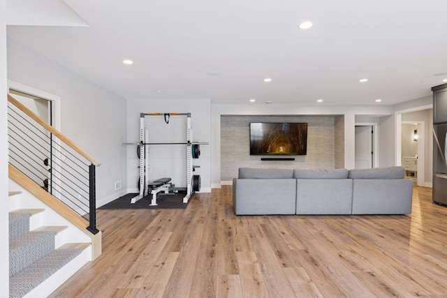 7450 73rd Ct N, Grant, MN 55082 - living area featuring stairs, light wood-style floors, baseboards, and recessed lighting
