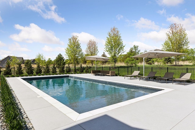 7450 73rd Ct N, Grant, MN 55082 - view of swimming pool with a patio area