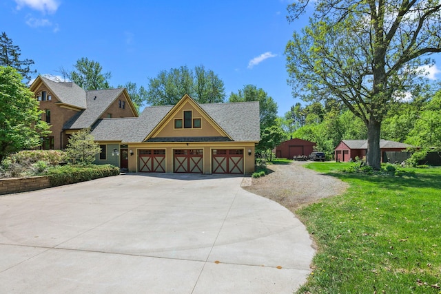 3375 Stark Rd NE, Cambridge Twp, MN 55008 - view of front of house featuring driveway, a front lawn, a garage, and roof with shingles