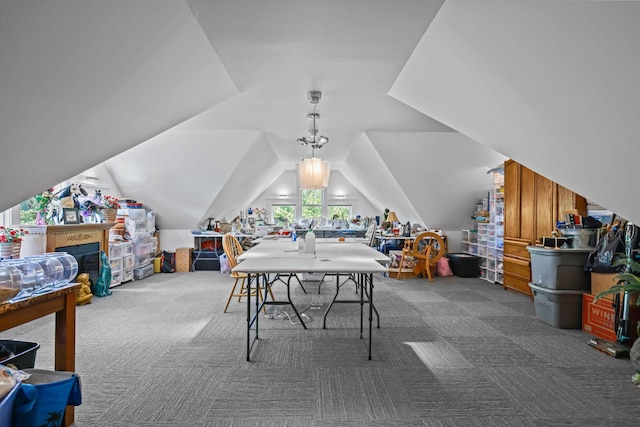 3375 Stark Rd NE, Cambridge Twp, MN 55008 - recreation room with dark carpet and lofted ceiling