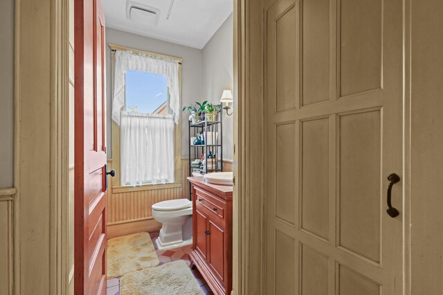 3375 Stark Rd NE, Cambridge Twp, MN 55008 - bathroom featuring vanity and wainscoting