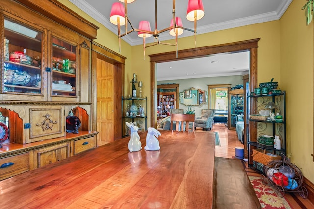 3375 Stark Rd NE, Cambridge Twp, MN 55008 - dining space with wood finished floors and ornamental molding