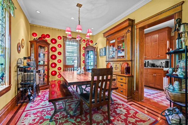 3375 Stark Rd NE, Cambridge Twp, MN 55008 - dining space with crown molding, wood finished floors, recessed lighting, and a chandelier