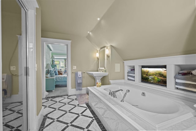 3375 Stark Rd NE, Cambridge Twp, MN 55008 - ensuite bathroom featuring lofted ceiling, a garden tub, and a stall shower