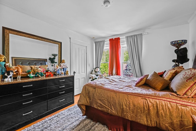3375 Stark Rd NE, Cambridge Twp, MN 55008 - bedroom with crown molding and wood finished floors