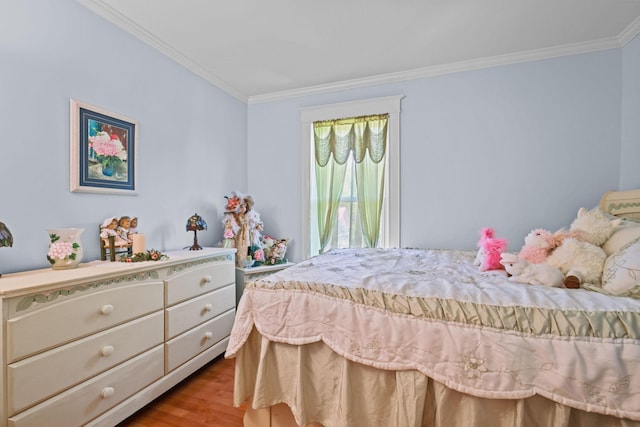 3375 Stark Rd NE, Cambridge Twp, MN 55008 - bedroom featuring ornamental molding and wood finished floors