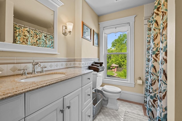 3375 Stark Rd NE, Cambridge Twp, MN 55008 - bathroom featuring tile patterned flooring, vanity, and curtained shower