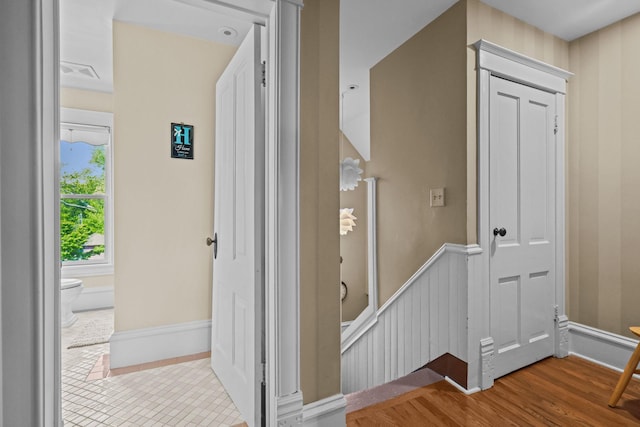 3375 Stark Rd NE, Cambridge Twp, MN 55008 - corridor featuring an upstairs landing and baseboards