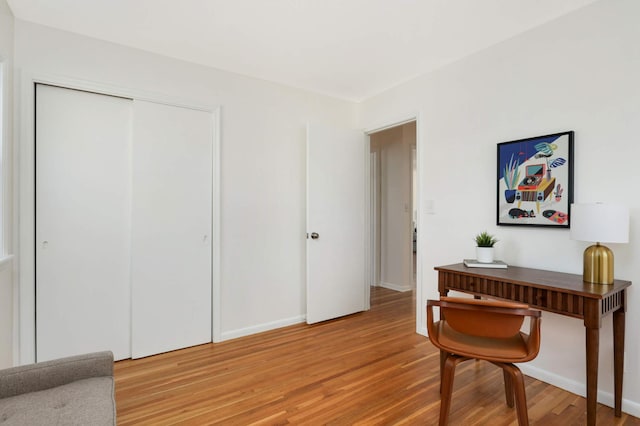office with light wood finished floors and baseboards