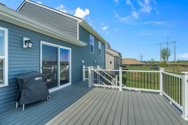 8506 Titanium Cir, Woodbury, MN 55129 - wooden deck with area for grilling and a yard