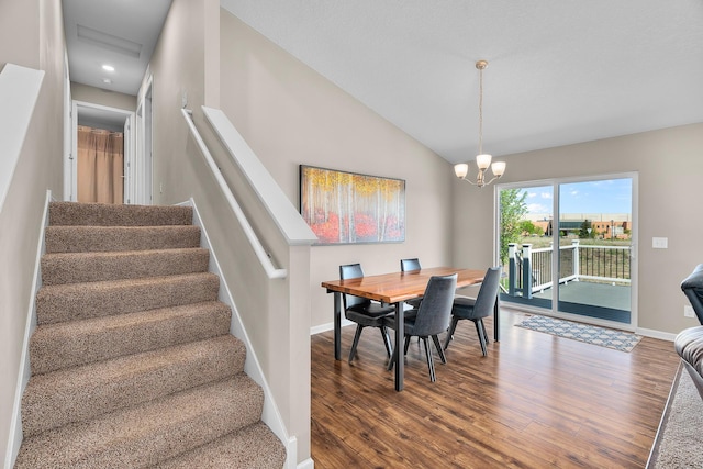 8506 Titanium Cir, Woodbury, MN 55129 - dining space with wood finished floors, stairway, a chandelier, baseboards, and lofted ceiling