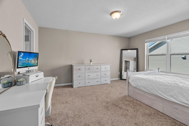 8506 Titanium Cir, Woodbury, MN 55129 - bedroom featuring light carpet, a textured ceiling, and baseboards