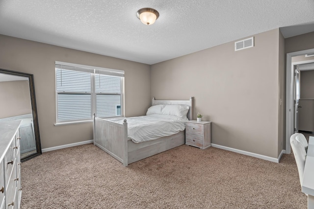 8506 Titanium Cir, Woodbury, MN 55129 - bedroom with light colored carpet, a textured ceiling, and baseboards