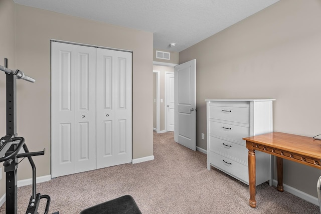 8506 Titanium Cir, Woodbury, MN 55129 - bedroom featuring light carpet, a closet, and baseboards