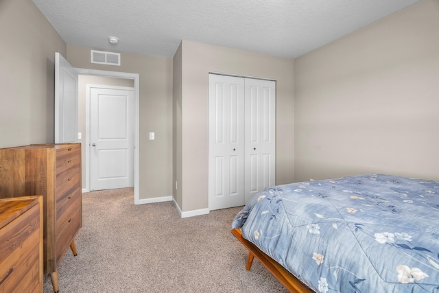 8506 Titanium Cir, Woodbury, MN 55129 - bedroom with carpet floors, baseboards, and a closet