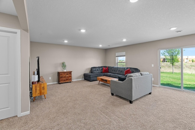 8506 Titanium Cir, Woodbury, MN 55129 - carpeted living room featuring recessed lighting, a textured ceiling, and baseboards