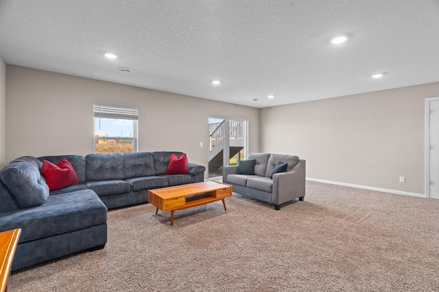8506 Titanium Cir, Woodbury, MN 55129 - living room with carpet floors, recessed lighting, healthy amount of natural light, a textured ceiling, and baseboards