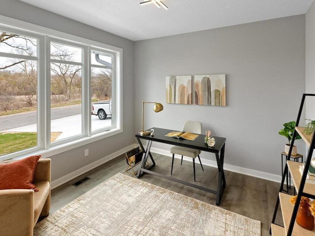 14913 Oakwood Dr, Burnsville, MN 55306 - office featuring baseboards, wood finished floors, and visible vents