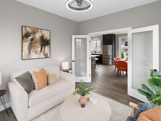14913 Oakwood Dr, Burnsville, MN 55306 - living room with a ceiling fan, french doors, and wood finished floors