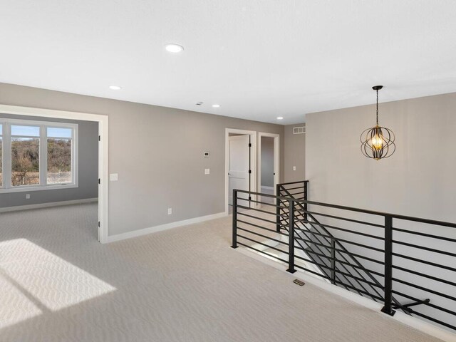 14913 Oakwood Dr, Burnsville, MN 55306 - spare room with recessed lighting, visible vents, carpet flooring, and baseboards
