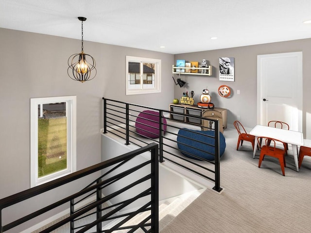 14913 Oakwood Dr, Burnsville, MN 55306 - staircase featuring recessed lighting, carpet floors, and a notable chandelier