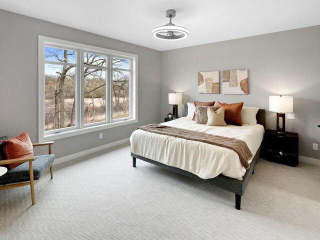 14913 Oakwood Dr, Burnsville, MN 55306 - bedroom featuring baseboards and light carpet