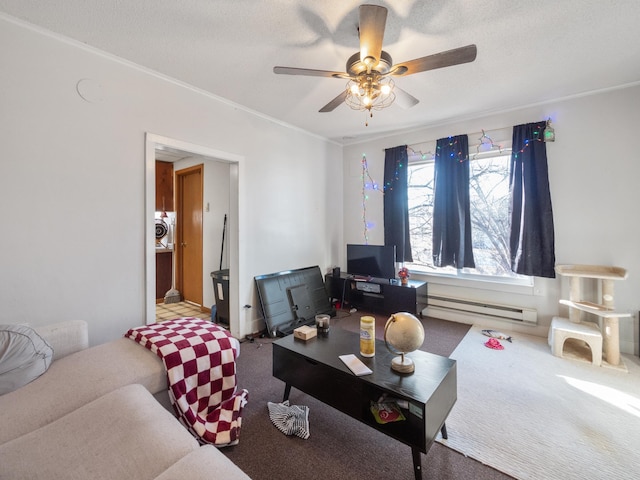 carpeted living area featuring a baseboard radiator, crown molding, and ceiling fan