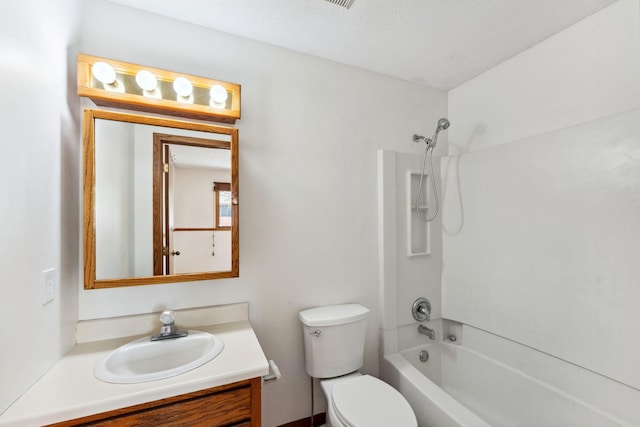 full bathroom featuring tub / shower combination, toilet, and vanity