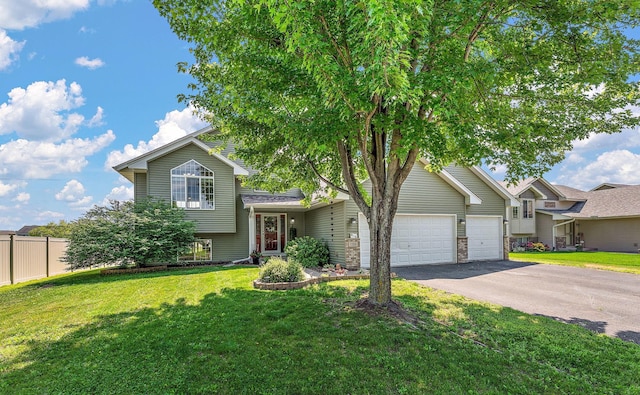 1106 Maplewood Ave SW, Isanti, MN 55040 - tri-level home featuring driveway and an attached garage