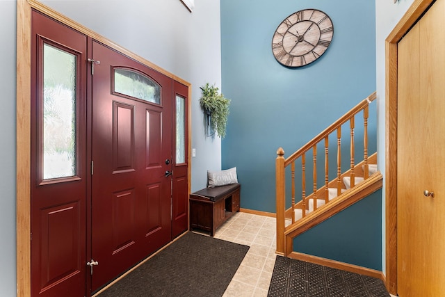 1106 Maplewood Ave SW, Isanti, MN 55040 - entryway featuring stairway and a high ceiling