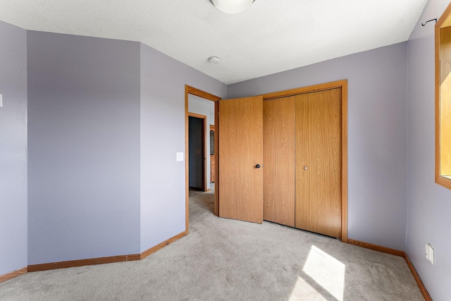 1106 Maplewood Ave SW, Isanti, MN 55040 - unfurnished bedroom featuring carpet flooring and a closet