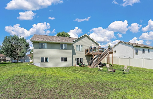1106 Maplewood Ave SW, Isanti, MN 55040 - back of house featuring stairway and a wooden deck