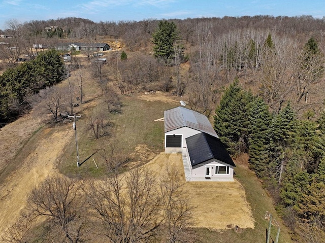 bird's eye view with a view of trees