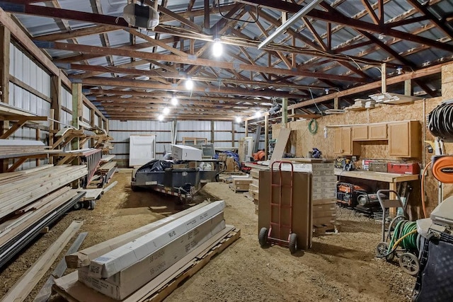 miscellaneous room with a workshop area