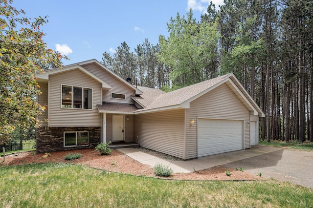 17813 224th Ave NW, Big Lake, MN 55309 - tri-level home with a shingled roof, an attached garage, and brick siding