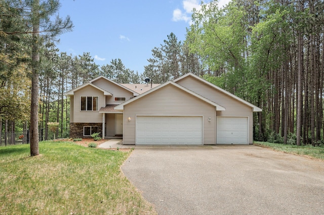 17813 224th Ave NW, Big Lake, MN 55309 - tri-level home featuring asphalt driveway and an attached garage