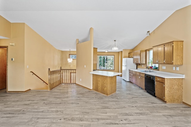 17813 224th Ave NW, Big Lake, MN 55309 - kitchen featuring freestanding refrigerator, black dishwasher, light wood-type flooring, light countertops, and a chandelier