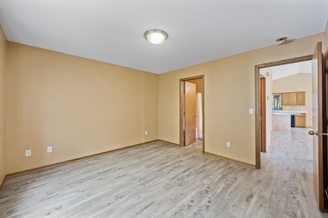 17813 224th Ave NW, Big Lake, MN 55309 - spare room featuring light wood finished floors and baseboards