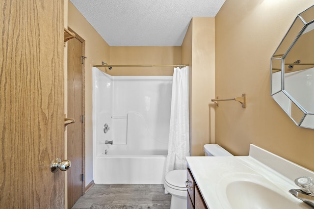 17813 224th Ave NW, Big Lake, MN 55309 - full bath with toilet, wood finished floors, vanity, shower / tub combo, and a textured ceiling