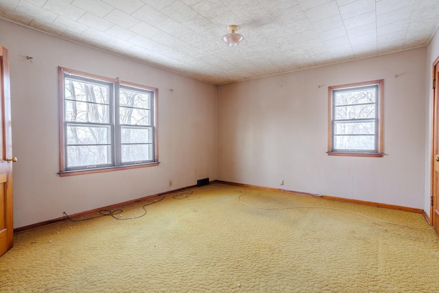 123 Thomas Hill Rd, Jackson, MN 56143 - empty room with baseboards and light carpet